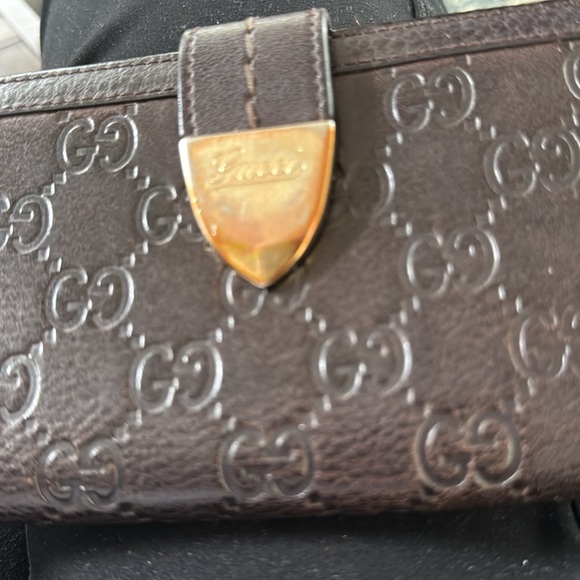 Gucci Chocolate Brown Long Wallet has its crossbody chain attached. - Picture 10 of 10
